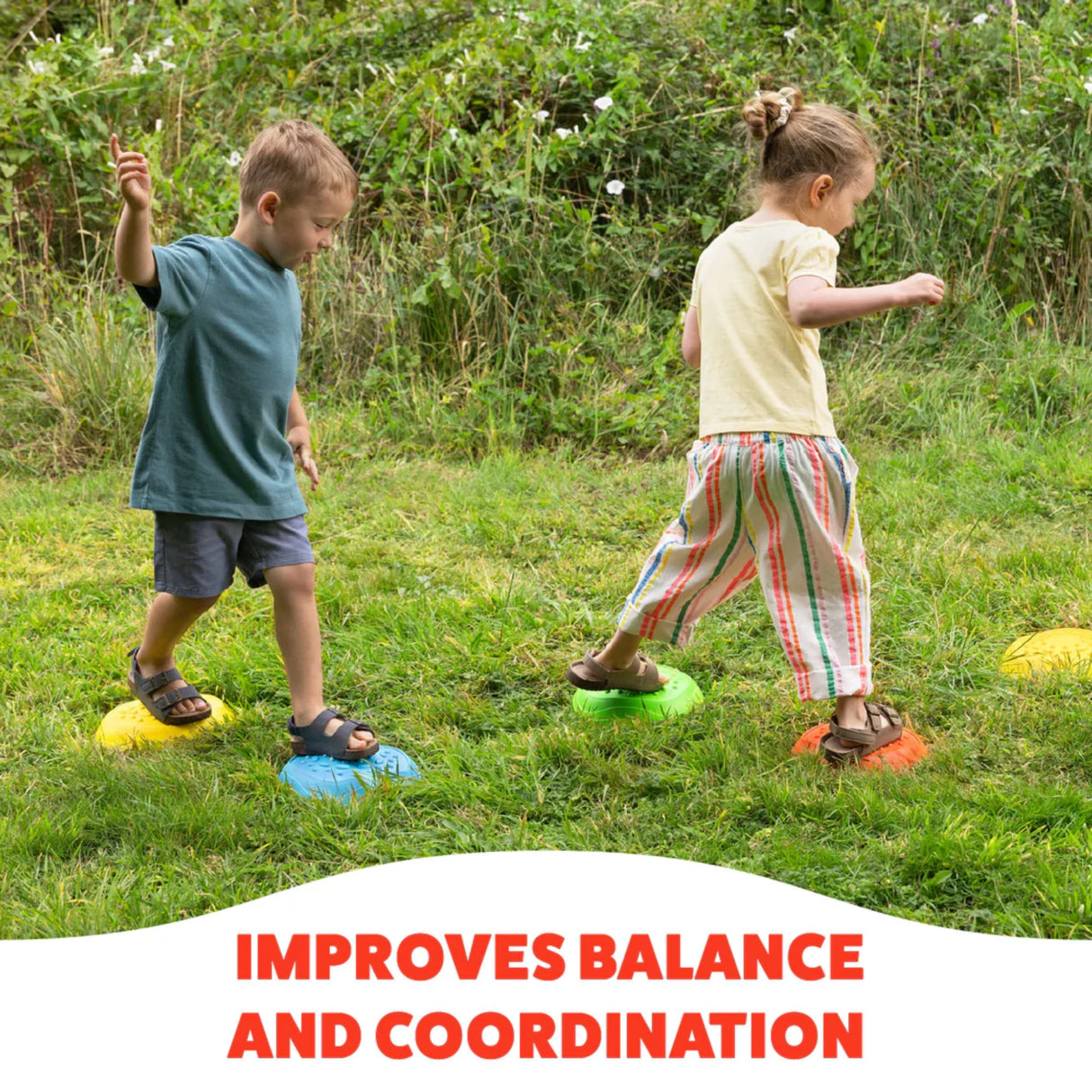 Two children balancing on coloured stepping stones on grass, boy on blue and yellow stones and girl on green and orange stones, with “IMPROVES BALANCE AND COORDINATION” text at bottom
