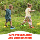 Two children balancing on coloured stepping stones on grass, boy on blue and yellow stones and girl on green and orange stones, with “IMPROVES BALANCE AND COORDINATION” text at bottom