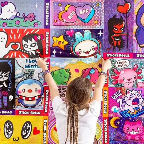 Child decorating a wall with colourful Sticki Rolls Jumbo Sticki posters featuring cute cartoon and holographic designs