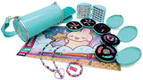 Sticki Rolluxe set displayed with teal cylinder case, open mini compartments, sticker sheets, beaded bracelets and necklace, and packaging