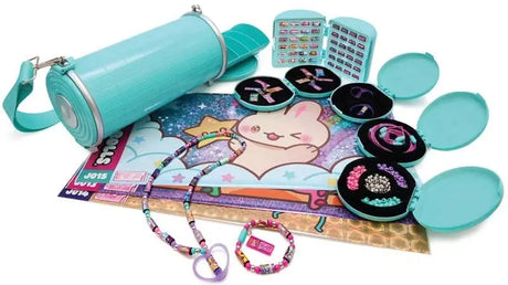 Sticki Rolluxe set displayed with teal cylinder case, open mini compartments, sticker sheets, beaded bracelets and necklace, and packaging
