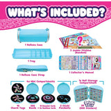 Sticki Rolluxe contents diagram showing the blue handbag, adjustable shoulder strap, removable tray, sticker storage compartment, four mini compartments, beads, cords, charms and jumbo stickers.