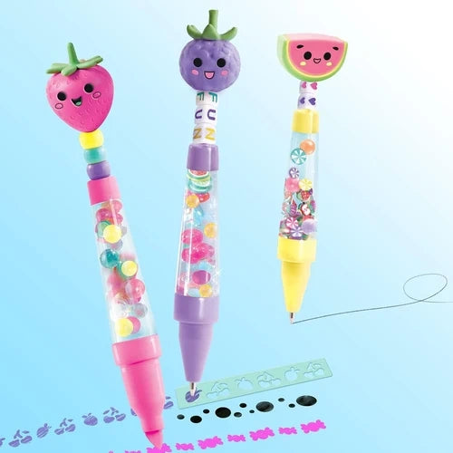 Three decorated pens with strawberry, purple fruit and watermelon toppers