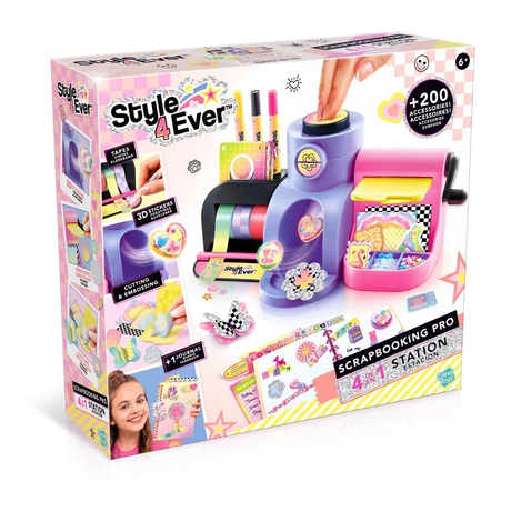 Style 4 Ever 4 in 1 Scrapbooking Studio Pro retail box viewed from the front and left side, showing the purple and pink craft workstation, decorative tapes, 3D stickers, paper cutting and embossing examples, and decorated journal.