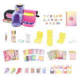 Style 4 Ever Scrapbooking Studio Pro contents arranged on a white background, including the purple and pink workstation, spiral notebook, three markers, cutting and embossing plates, decorative tapes, patterned paper, sticker sheets and packets of craft decorations.
