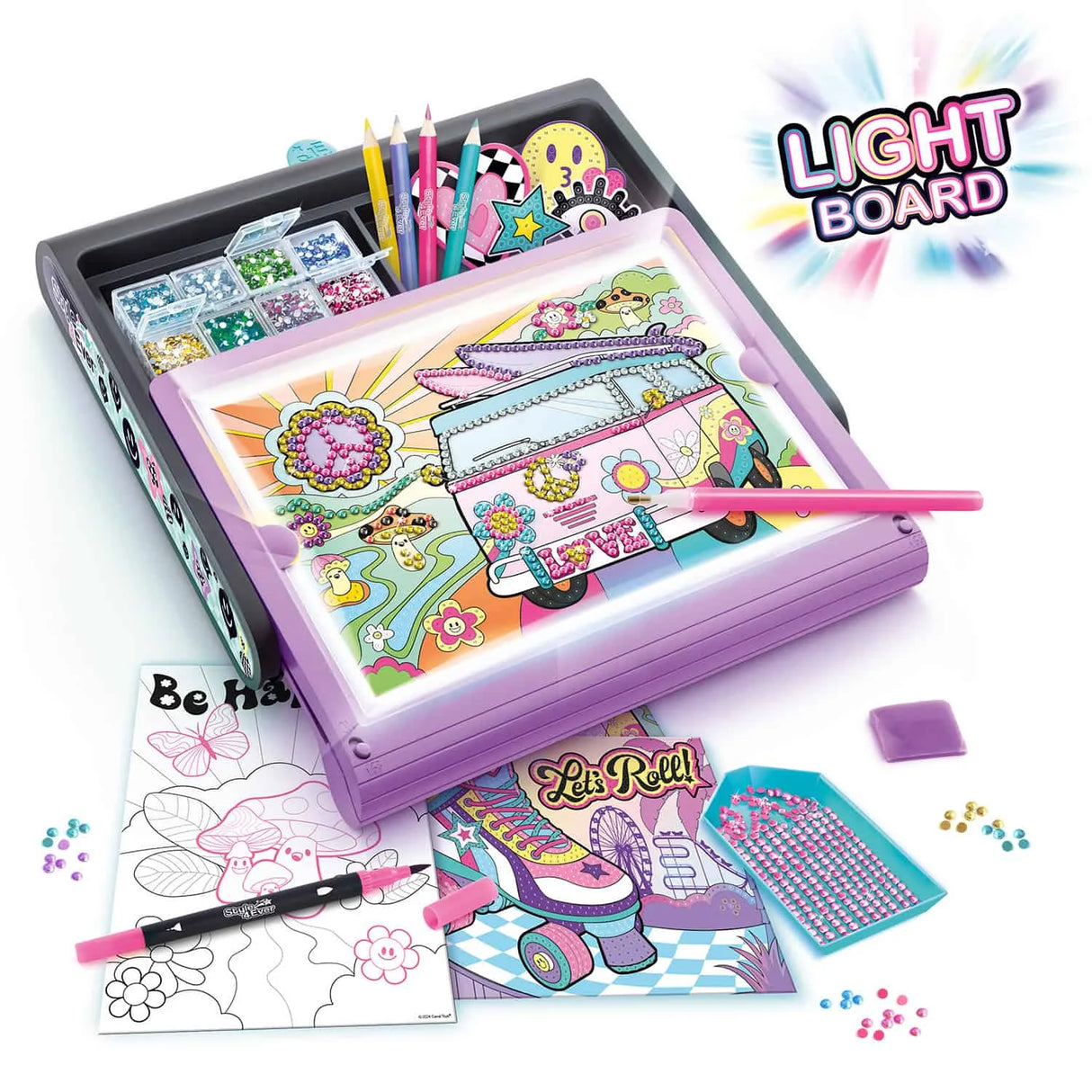 Active lightboard with colourful gem art, pencils, and roller skate design in progress – Ireland