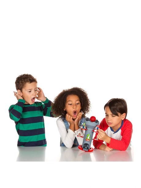 Three children playing the Super Mario Blow Up! Shaky Tower game