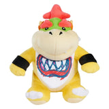 Super Mario Bowser Jr 22 cm soft toy sitting upright against a white background, showing red hair, green head, yellow feet and white bib with a printed mouth design.