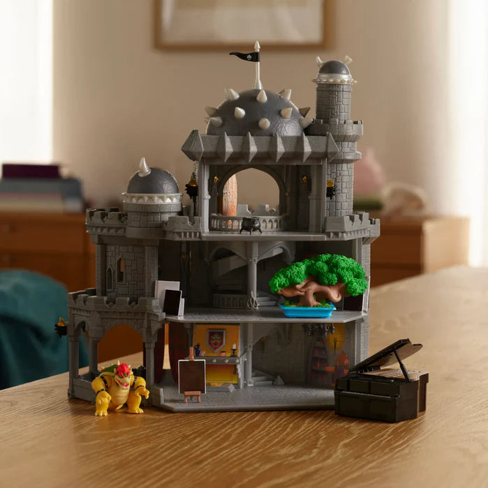 Super Mario Galaxy Movie Bowser Castle Playset open on a table with Bowser figure and piano