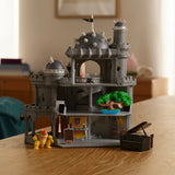 Super Mario Galaxy Movie Bowser Castle Playset open on a table with Bowser figure and piano