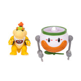 Super Mario Galaxy Movie Bowser Jr. figure beside the white and green Clown Car