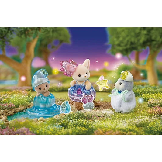 Three Sylvanian Families fairy babies arranged in a magical woodland setting with flowers, trees, a glowing purple sky and their star, gemstone and water droplet friends.
