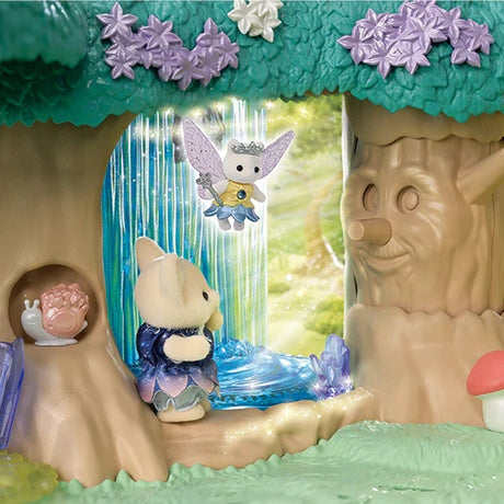 Fennec Fox baby in a dark blue flower dress looking towards a small winged Star Fairy above a blue waterfall, with flowers and a smiling tree trunk.