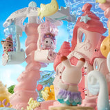Sylvanian Families Baby Mermaid Castle shown close up with a hanging shell seat and small animal figures