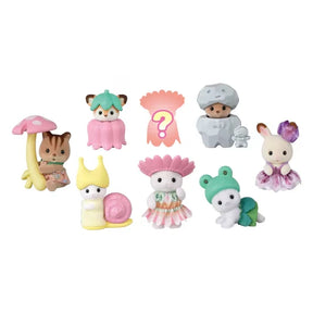 Small Sylvanian baby figures shown in woodland fairy costumes with a pink mystery silhouette