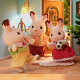 Chocolate Rabbit figures shown in a room scene with a football and rug