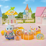 Blue bird figure shown with a yellow juice stand, orange counter and small drink accessories