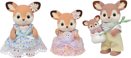 Deer Family figures wearing floral outfits including father, mother, girl and baby in sling in Ireland.