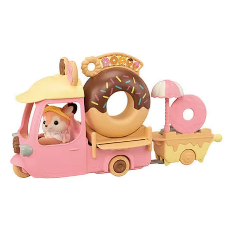 Dip Dip Donuts Wagon toy vehicle driven by Deer Mother figure with fryer trailer connected in Ireland.