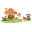 Sylvanian Families Fairy Mushroom House playset with its large red mushroom roof, miniature characters and accessories arranged on a white background.