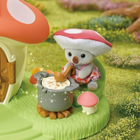 Sylvanian Families Fairy Mushroom House with its red mushroom shaped roof, miniature characters and woodland surroundings.