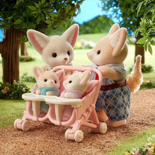 Sylvanian Families Fennec Fox Family promotional photograph in a warm brown and cream setting.