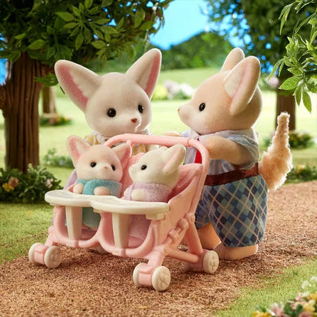 Sylvanian Families Fennec Fox Family promotional photograph in a warm brown and cream setting.