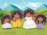 Sylvanian Families Hedgehog Family posed outdoors in meadow with mountains in background in Ireland 