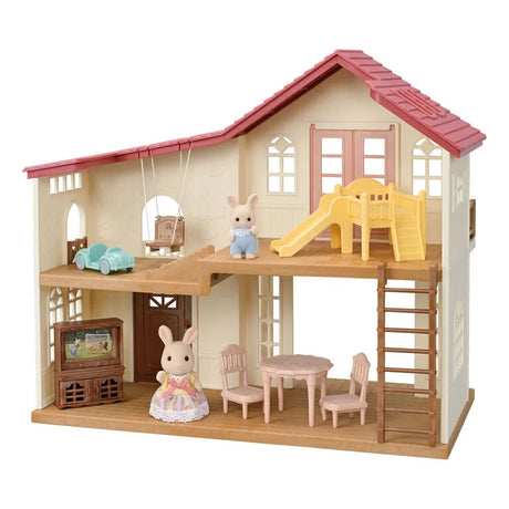Sylvanian Families Hilltop Terrace house playset with slide swing and figures in Ireland