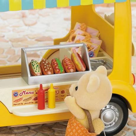 Close-up of the Sylvanian Families Hot Dog Van serving counter with hot dogs and sauce bottles