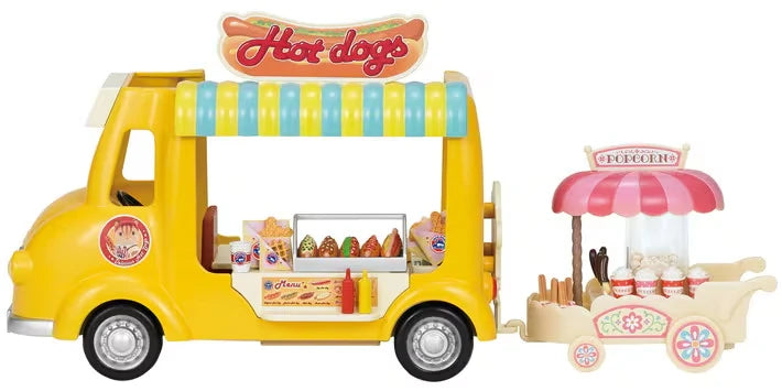 Sylvanian Families Hot Dog Van shown beside a pink food cart