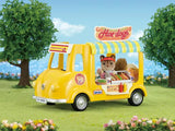 Yellow Sylvanian Families Hot Dog Van shown with trees and a Hot Dogs sign