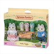 Sylvanian Families Husky Family packaging showing father, mother, triplets, and sleigh against garden backdrop in Ireland.