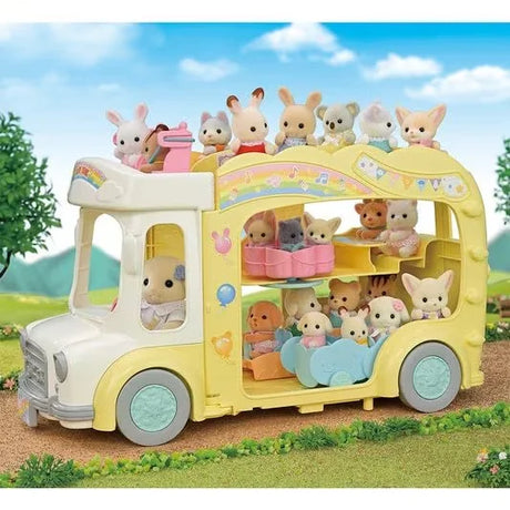 Rainbow Fun Nursery Bus play scene featuring Sylvanian Families babies enjoying rooftop seats and playground fun in Ireland.