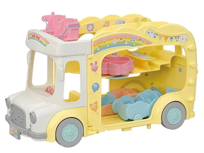 Yellow Sylvanian Families Rainbow Fun Nursery Bus toy with fold-out seats and play accessories displayed in Ireland.