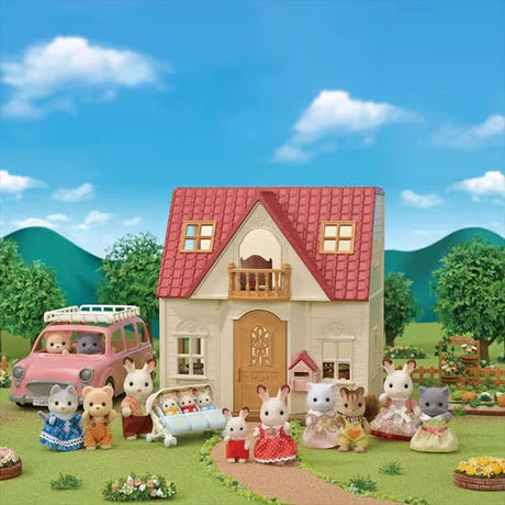 Sylvanian Families Red Roof Cosy Cottage exterior showing red roof house, garden, and Sylvanian Families figures in Ireland.