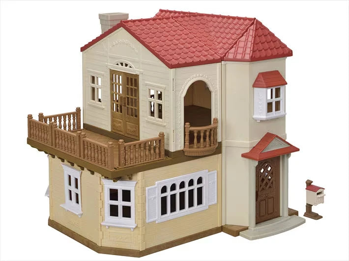 Sylvanian Families Red Roof Country Home shown from the front with red roof, balcony and side entrance