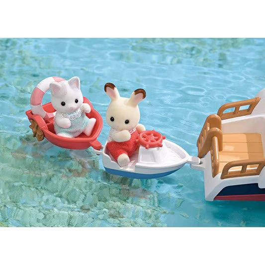 White miniature motorboat carrying a rabbit in red clothes towing a red boat with a grey cat wearing a pale blue outfit and swimming ring.