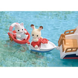 White miniature motorboat carrying a rabbit in red clothes towing a red boat with a grey cat wearing a pale blue outfit and swimming ring.
