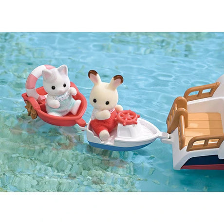 White miniature motorboat carrying a rabbit in red clothes towing a red boat with a grey cat wearing a pale blue outfit and swimming ring.