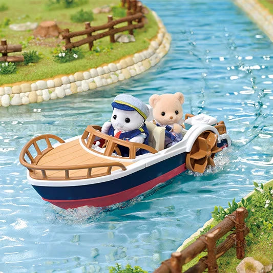 White seal figure wearing a blue captain outfit and beige animal figure seated in a blue and red leisure boat with brown side paddle wheels on water.