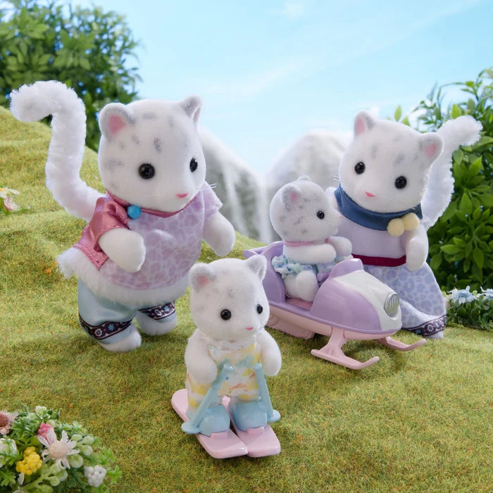 Four Snow Leopard figures shown outdoors with a baby snowmobile and small flowers