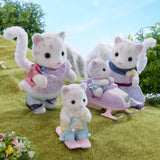 Four Snow Leopard figures shown outdoors with a baby snowmobile and small flowers