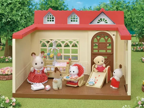 Playtime scene inside Sweet Raspberry Home as the Chocolate Rabbit Baby slides down with two friends and scattered toys in Ireland.