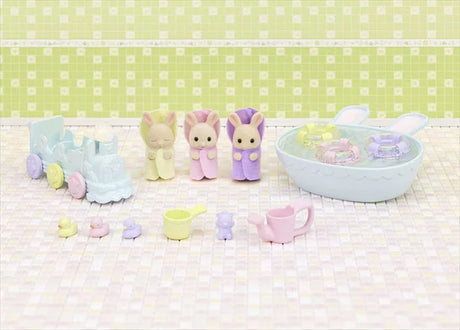 Sylvanian Families Baby Bathtime figures Isla, Iris and Owen with tub, pushcart train and toy accessories in Ireland.