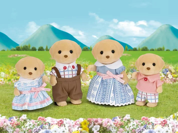 Sylvanian Families Yellow Labrador Family posed outdoors in flower filled meadow with mountains in Ireland