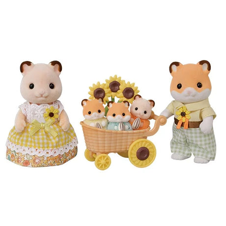 Sylvanian Families Hamster Family with mother in a yellow dress, father in green checked trousers and three baby hamsters sitting in a sunflower decorated carriage against a white background.