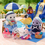 Sylvanian Families Seal Family enjoying a poolside picnic, with the mother reading a book under a parasol, the babies playing with ice cream and a ball, and the father beside a picnic basket.