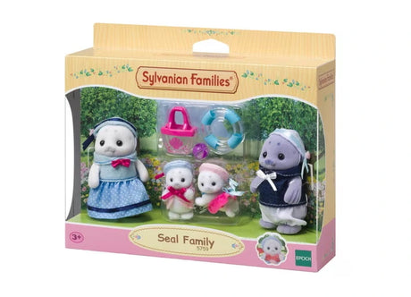 Sylvanian Families Seal Family 5759 retail packaging showing all four seal figures through the front window, alongside a pink beach bag, transparent blue swimming ring and purple ball.