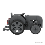 Massey Ferguson TEA 20 Mini BRIXIES model in full side profile facing right with the steering wheel, grey body and rear hitch visible